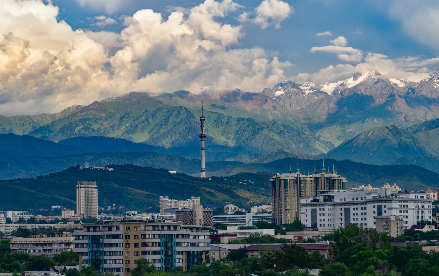 Almaty skyline with Kok-Tobe tower and the snow-capped Tian Shan mountains behind the city